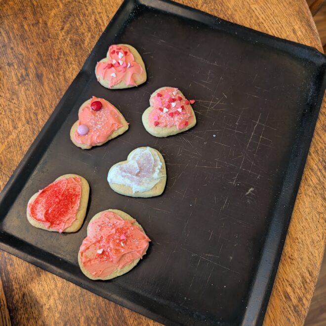Frosting cookies with bestie